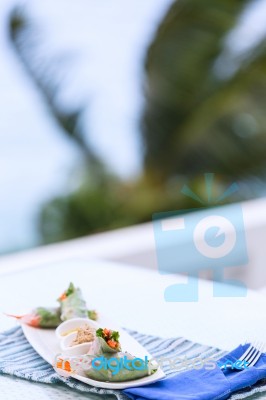 Vietnamese Spring Rolls With Vegetables And Coriander On A Plate… Stock Photo