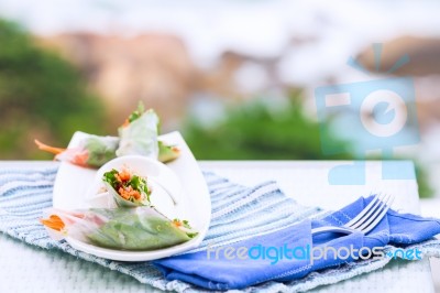 Vietnamese Spring Rolls With Vegetables And Coriander On A Plate… Stock Photo