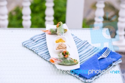 Vietnamese Spring Rolls With Vegetables And Coriander On A Plate… Stock Photo