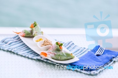 Vietnamese Spring Rolls With Vegetables And Coriander On A Plate… Stock Photo