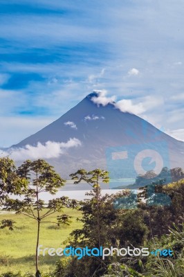 View At The Volcano Arenal Over Lake Arenal In Costa Rica Stock Photo