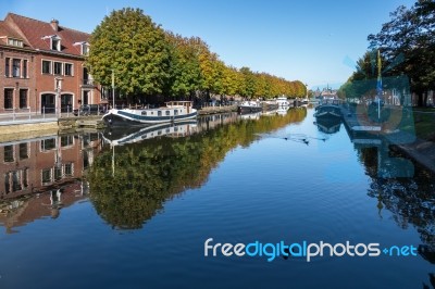 View Down A Canal In Bruges West Flanders Belgium Stock Photo