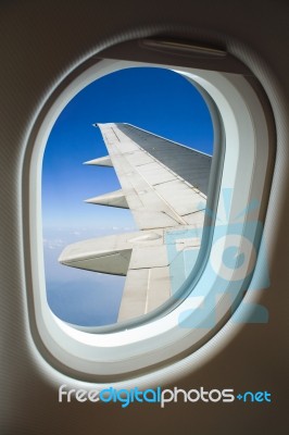 View From Window With Airplane Stock Photo