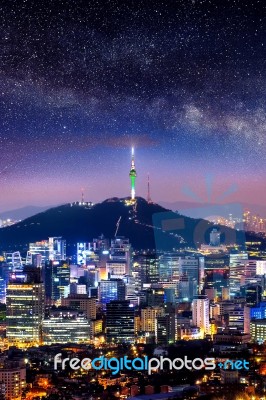 View Of Downtown Cityscape And Seoul Tower With Milky Way In Seoul, South Korea Stock Photo