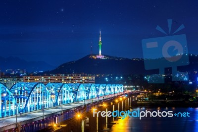 View Of Downtown Cityscape At Dongjak Bridge And Seoul Tower Over Han River In Seoul, South Korea Stock Photo