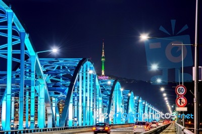 View Of Downtown Traffic At Dongjak Bridge And Seoul Tower Over Han River In Seoul, South Korea Stock Photo