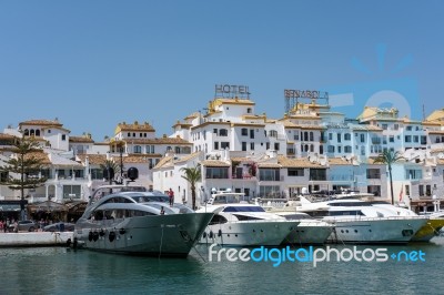 View Of Luxury Yachts In The Harbour At Porto Banus Stock Photo