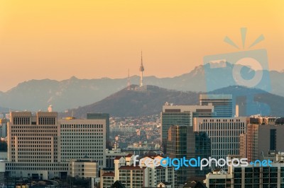 View Of Seoul Tower And Cityscape With Golden Light In Seoul, South Korea Stock Photo