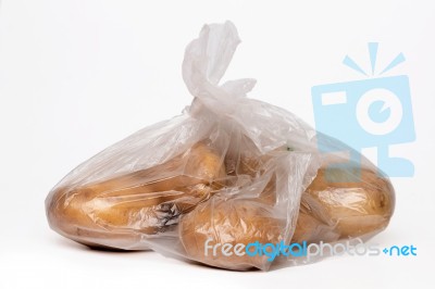 View Of Some Bananas Inside A Plastic Bag Stock Photo