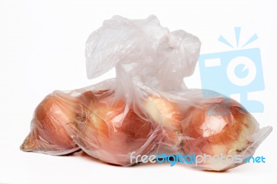 View Of Some Onions Inside A Plastic Bag Stock Photo