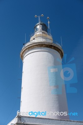 View Of The Lighthouse In Malaga Stock Photo