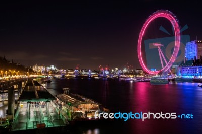 View Of The London Eye At Night Stock Photo