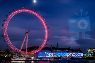 View Of The London Eye At Night Stock Photo