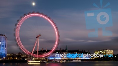 View Of The London Eye At Night Stock Photo