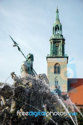 View Of The Neptune  Fountain With Marienkirche In The Backgroun… Stock Photo