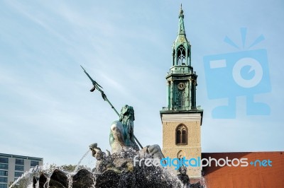 View Of The Neptune  Fountain With Marienkirche In The Backgroun… Stock Photo