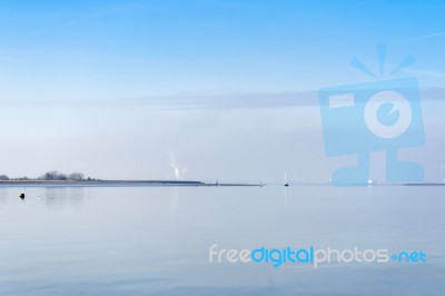 View Of The River Swale From Harty Island Kent On A Tranquil Win… Stock Photo