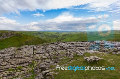 View Of The Yorkshire Dales Over The Rocky Malham Cove Stock Photo