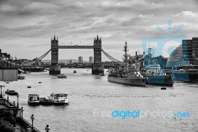 View Of Tower Bridge And The Pool Of London With Two Warships Stock Photo