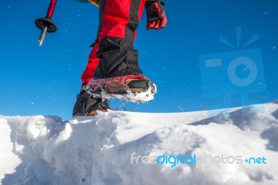 View Of Walking On Snow With Snow Shoes And Shoe Spikes In Winte… Stock Photo