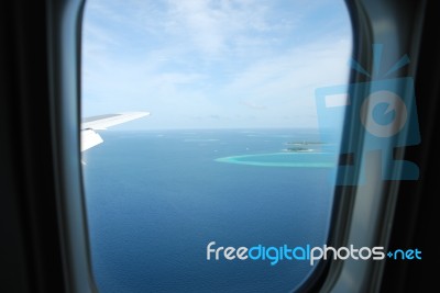 View On Maldives Islands From Airplane Stock Photo