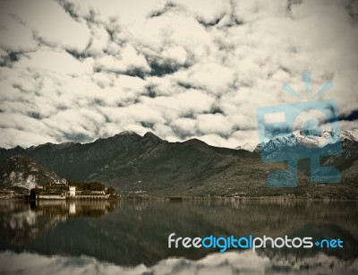 View Over Lake Maggiore And Alps Mountains Stock Photo