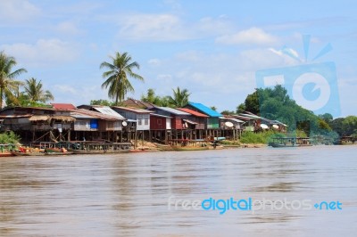 Village Beside Mekong River In Champasak Southern Of Laos Stock Photo