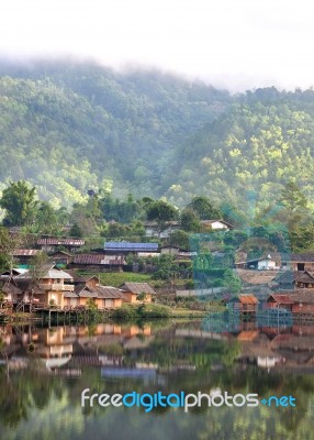 Village Beside Mountain Stock Photo