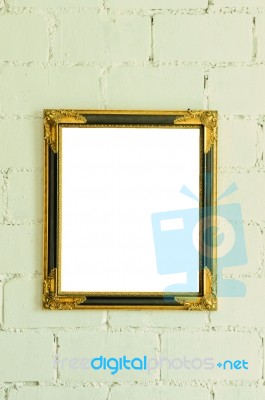 Vintage Gold Picture Frame On White Wall Stock Photo