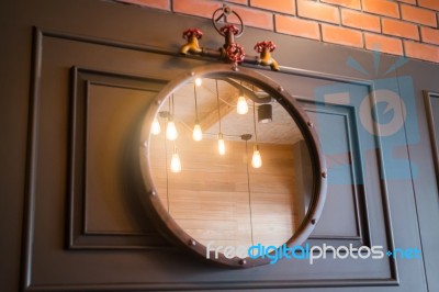 Vintage Mirror Decorated On Old Style Wall Stock Photo