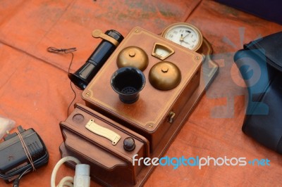 Vintage Old Telephone In Two Hands Market Stock Photo