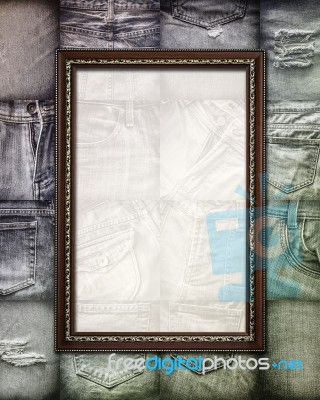 Vintage Picture Frame On Collage Jeans Stock Photo