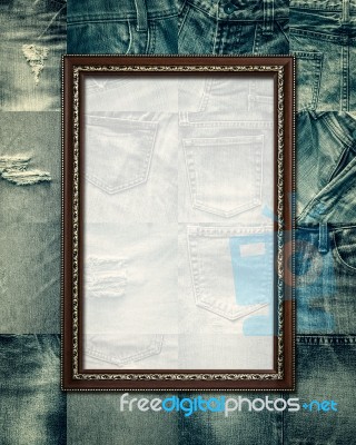 Vintage Picture Frame On Collage Jeans Stock Photo