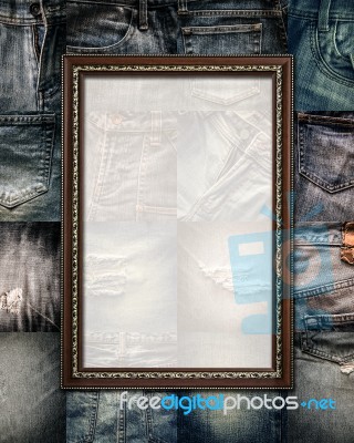 Vintage Picture Frame On Collage Jeans Stock Photo