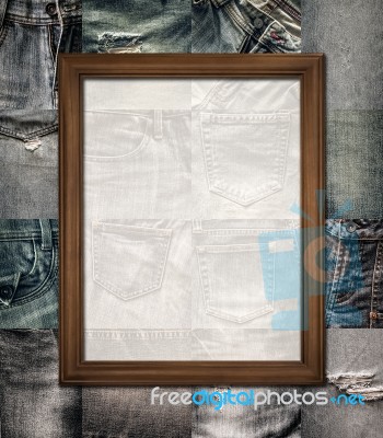 Vintage Picture Frame On Collage Jeans Stock Photo