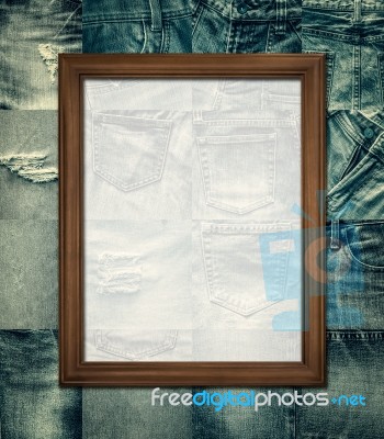 Vintage Picture Frame On Collage Jeans Stock Photo