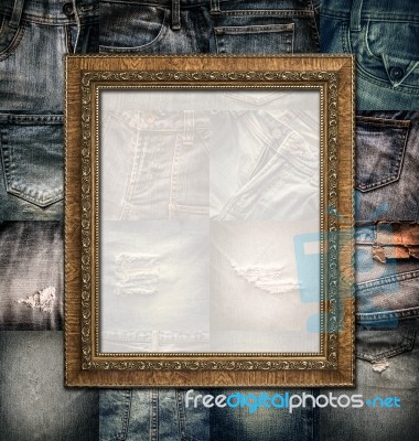 Vintage Picture Frame On Collage Jeans Stock Photo