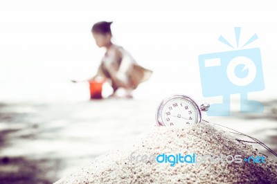 Vintage Pocket Watch On Sand Stock Photo