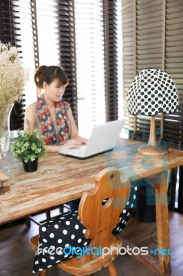 Vintage Polka Dot Lamp With Intentionally Blurred Working Woman Stock Photo