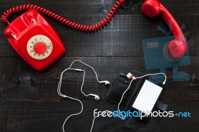 Vintage Telephone Vs Smartphone Stock Photo