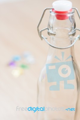 Vintage Water Bottle On Wooden Background Stock Photo