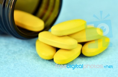 Vitamin C Tablet On Blue Background. High Dose Vitamin C Dietary… Stock Photo