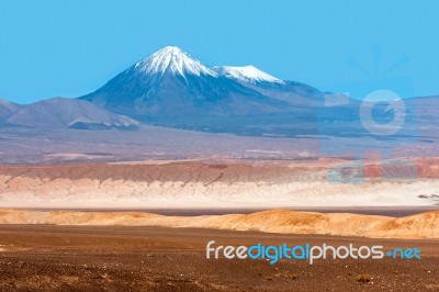 Volcanoes Licancabur And Juriques, Moon Valley, Atacama, Chile Stock Photo