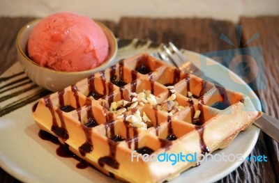 Waffle With Scoop Of Strawberry Sherbet Ice Cream Stock Photo