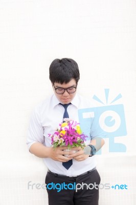 Waiting For His Girlfriend. Close Up Of Handsome Young Man Holdi… Stock Photo