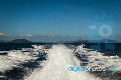 Wake Behind The Boat In The Sea Stock Photo