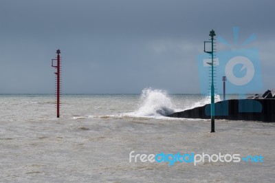 Warning Lamps In The Sea At Lyme Regis Stock Photo