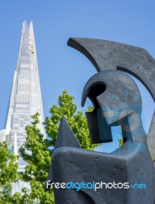 Warrior Sculpture In Front Of The Shard In London Stock Photo