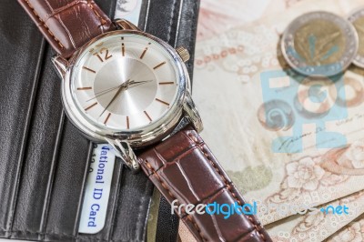 Watch And Wallet On Banknote Stock Photo