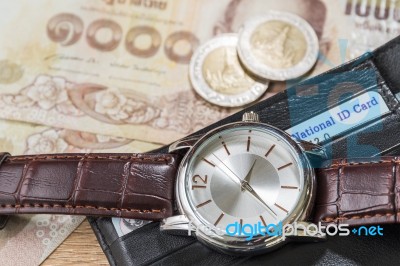 Watch And Wallet On Banknote Stock Photo